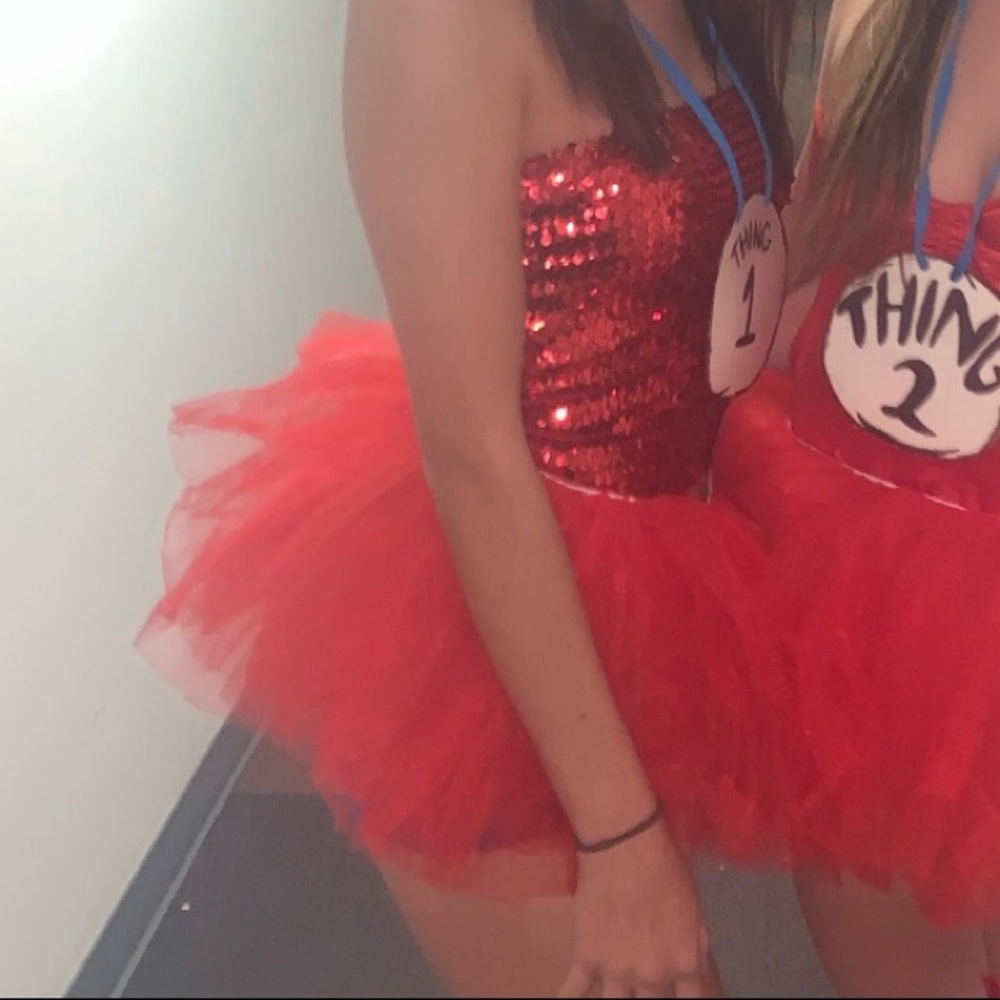 red strapless sequence top and red tutu